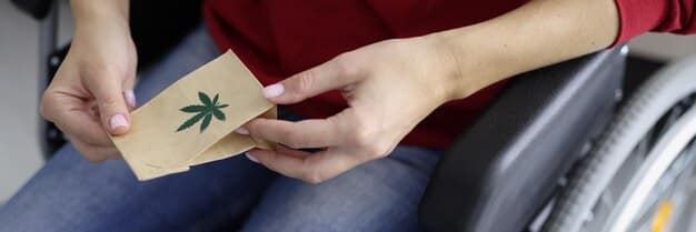 A close-up of a Passe Livre card for people with disabilities being held by a person, with a blurred background of a train station. Focus is on the card and the person's hand, with the station lights visible.