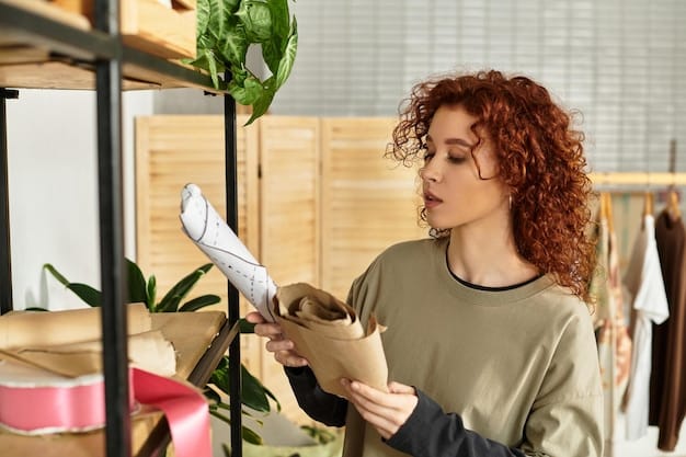 Business owner using biodegradable packaging. A small business owner is carefully packaging products using biodegradable materials, showcasing their dedication to sustainability and eco-friendly practices.