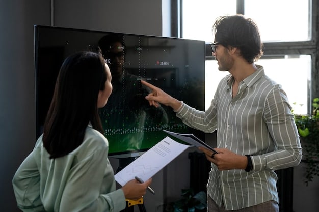 An energy audit being conducted in a small office, with a professional using a thermal camera to identify energy inefficiencies. Show employees participating and asking questions.