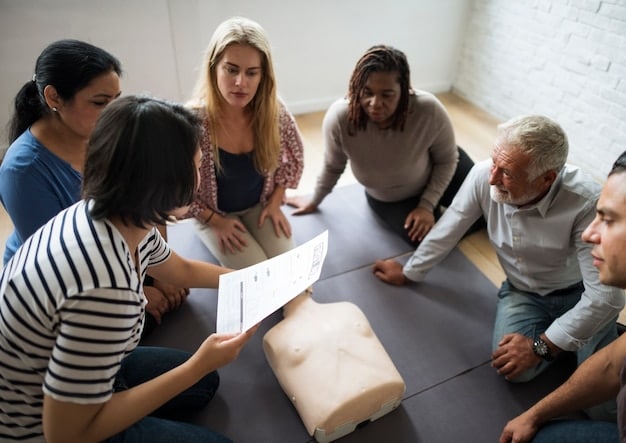 A group of volunteers participating in a training session, with a focus on teamwork, learning new skills, and preparing for volunteer work.