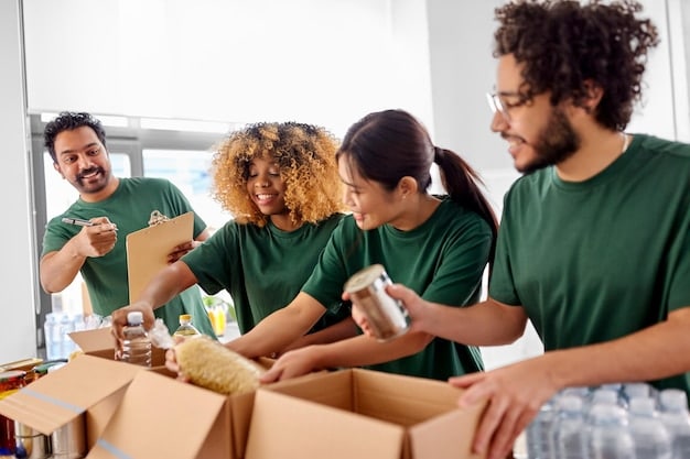 A team of volunteers packing food boxes in a warehouse, with the organization's logo visible in the background. The volunteers are wearing matching shirts and appear focused on their tasks.