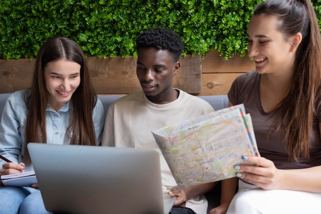 A group of diverse students map reading and planning in a rural community, surrounded by locals. They are using laptops and maps, discussing strategies.