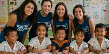 Voluntários interagindo com crianças em sala de aula, promovendo o engajamento comunitário na educação.