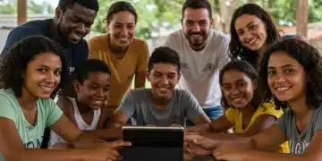 Pessoas de uma comunidade usando tecnologia para colaborar em um projeto social.