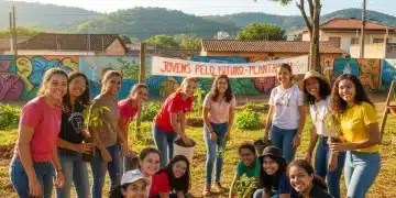 Jovens estudantes brasileiros participando ativamente de uma ação de voluntariado em grupo, sorrindo e colaborando em um ambiente ao ar livre.